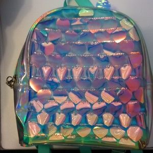 I am selling a small book bag from Claire's